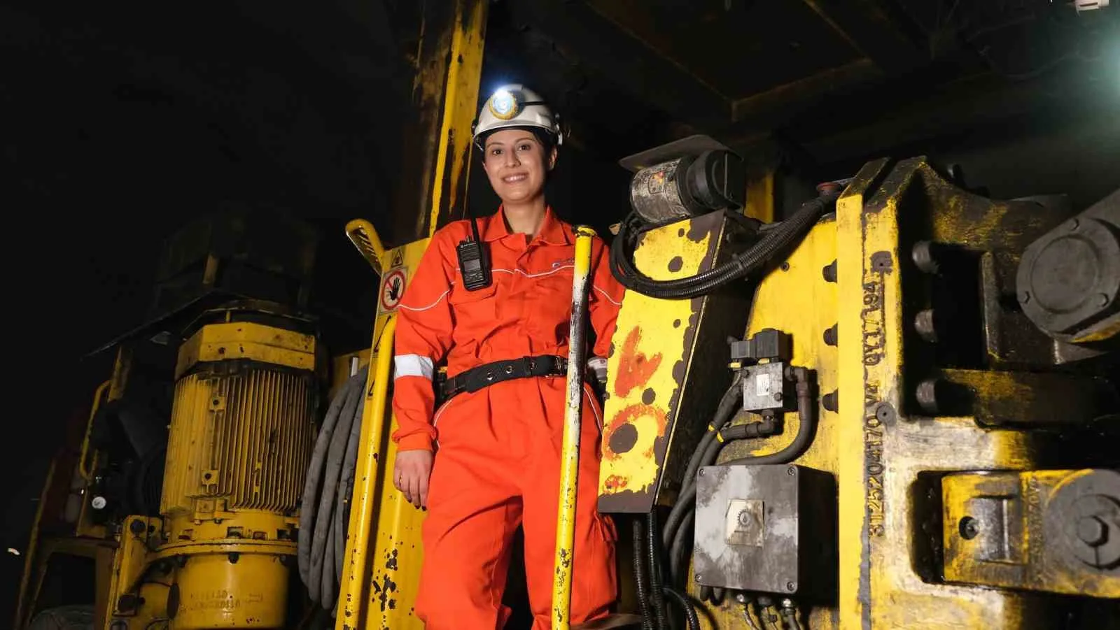 Female construction worker in safety gear on a construction site in Istanbul, Turkey.
